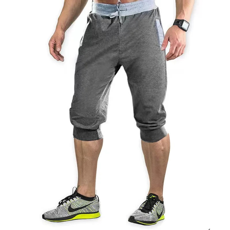 2024 New Mens cross-border sports pants men's casual jogging shorts elastic fitness pants cropped pants M-4XL Men