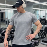 New Summer Leisure Running T-Shirt Gym Training Tops Elastic Quick Drying Pure Color Short Sleeve Sports T-Shirt Men Sportswear