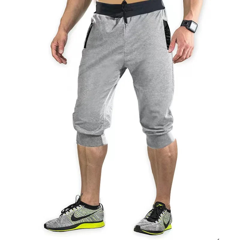 2024 New Mens cross-border sports pants men's casual jogging shorts elastic fitness pants cropped pants M-4XL Men